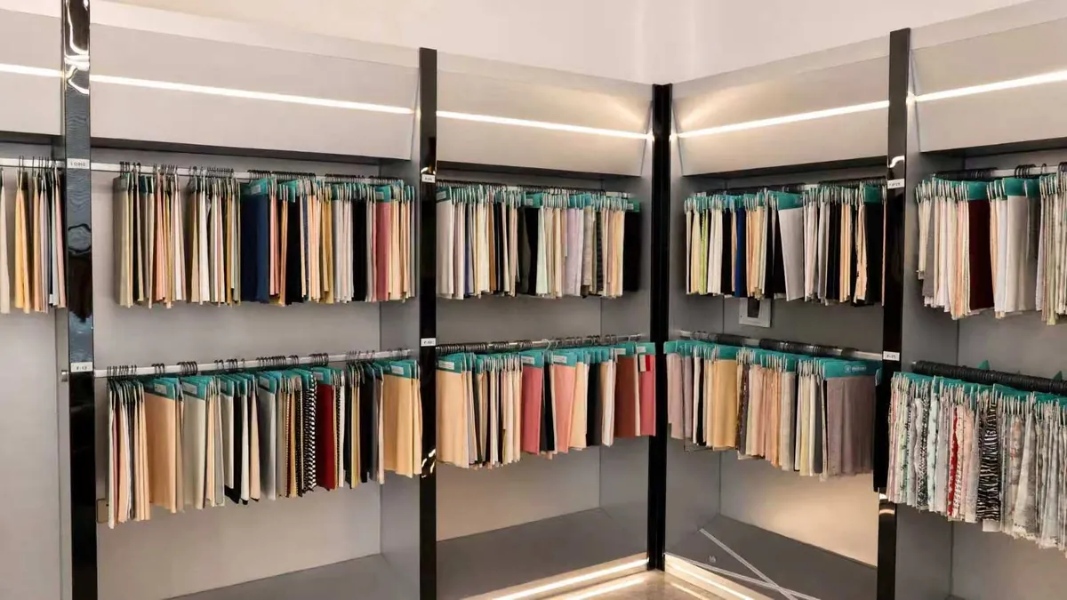 Sample room shelves with fabric swatch books